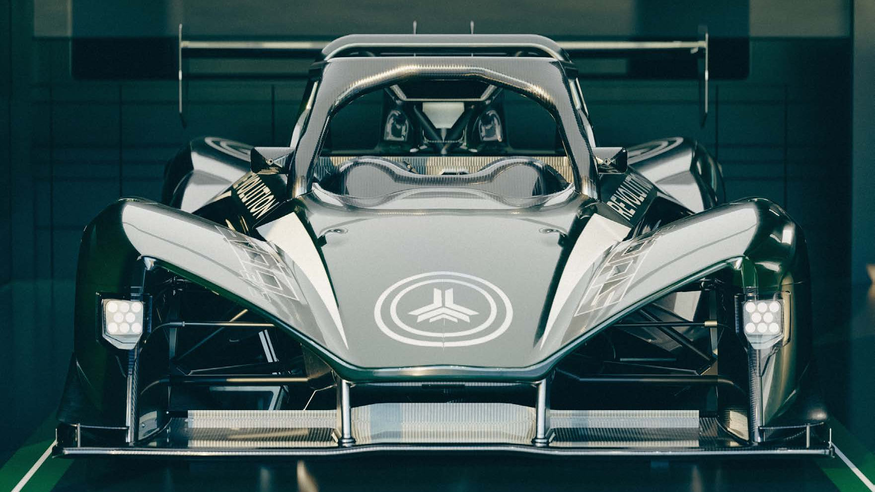 A futuristic low-profile race car with a glossy dark metallic finish, featuring a large front splitter, exposed wheel arches, and a circular emblem on the hood, photographed in a dim showroom or studio setting.